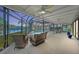 Relaxing pool area with covered lanai, spa, and water views at 608 69Th W Ave, Bradenton, FL 34207