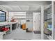 Workshop area with workbench, shelving, and storage cabinets at 608 69Th W Ave, Bradenton, FL 34207