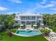 Aerial view of a luxurious waterfront home at 641 Key Royale Dr, Holmes Beach, FL 34217