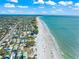 Beachfront property aerial view, showing beach and homes at 641 Key Royale Dr, Holmes Beach, FL 34217