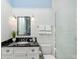 Modern bathroom with a vanity, toilet, and glass shower at 641 Key Royale Dr, Holmes Beach, FL 34217