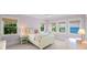 Charming bedroom with a comfortable bed and lovely water views at 641 Key Royale Dr, Holmes Beach, FL 34217