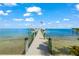 Scenic view of a private dock on clear water at 641 Key Royale Dr, Holmes Beach, FL 34217