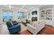 Bright living room with stunning water views and comfortable seating at 641 Key Royale Dr, Holmes Beach, FL 34217