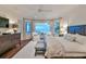 Spacious main bedroom with water views and king-size bed at 641 Key Royale Dr, Holmes Beach, FL 34217