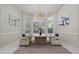 Cozy dining room featuring modern decor, stylish light fixture, and large bay windows at 6779 Ashley Ct, Sarasota, FL 34241