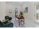 Bright office space with natural light, neutral tones and sleek tiled floors for a modern, clean aesthetic at 6779 Ashley Ct, Sarasota, FL 34241