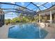 Relaxing screened pool with a spa and lush views; a perfect setting for outdoor enjoyment and leisure at 6779 Ashley Ct, Sarasota, FL 34241