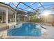 Gorgeous screened pool features a spa and direct access to the home's patio and outdoor living spaces at 6779 Ashley Ct, Sarasota, FL 34241