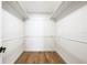 Large walk-in closet with double hanging rods at 7516 4Th Avenue Nw Dr, Bradenton, FL 34209