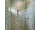 Walk-in shower with herringbone patterned tile at 901 30Th E Ct, Bradenton, FL 34208