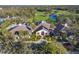 Aerial view of clubhouse with tennis courts nearby at 9604 53Rd E Ter, Bradenton, FL 34211