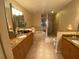 Spacious bathroom with double vanity and jacuzzi tub at 9923 Manatee W Ave # 4, Bradenton, FL 34209