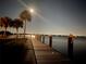 Night view of private dock and calm water at 9923 Manatee W Ave # 4, Bradenton, FL 34209