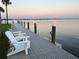 Private dock with seating, perfect for relaxing at 9923 Manatee W Ave # 4, Bradenton, FL 34209