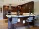 Gourmet kitchen boasts modern appliances and expansive island with seating at 9923 Manatee W Ave # 4, Bradenton, FL 34209