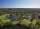 Aerial view of golf course and clubhouse at 9937 Laurel Valley Avenue Cir, Lakewood Ranch, FL 34202