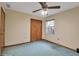 Bedroom with double-door closet and window at 10616 Forest Run Dr, Bradenton, FL 34211