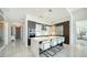 Modern kitchen with island seating and stainless steel appliances at 1155 N Gulfstream Ave # 207, Sarasota, FL 34236