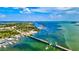 Aerial view of waterfront homes and marina at 12939 Seasong Ter, Bradenton, FL 34211
