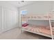 Bedroom with bunk beds and ample closet space at 12939 Seasong Ter, Bradenton, FL 34211