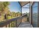 Screened balcony overlooks lush tropical landscape at 1460 Landings Cir # 51, Sarasota, FL 34231