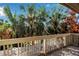Relaxing balcony with view of tropical foliage at 1460 Landings Cir # 51, Sarasota, FL 34231