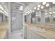 Double vanity bathroom with shower and mirrored walls at 1460 Landings Cir # 51, Sarasota, FL 34231
