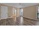 Spacious bedroom with wood-look floors and mirrored closet at 1460 Landings Cir # 51, Sarasota, FL 34231