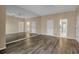 Large bedroom with mirrored wall and ensuite bathroom access at 1460 Landings Cir # 51, Sarasota, FL 34231