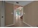 View from the entryway shows tile floors and a view into the living room at 1460 Landings Cir # 51, Sarasota, FL 34231