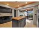 Updated kitchen with island, granite countertops, and dark cabinets at 1460 Landings Cir # 51, Sarasota, FL 34231