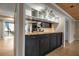 Updated kitchen featuring granite countertops and dark wood cabinets at 1460 Landings Cir # 51, Sarasota, FL 34231