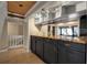 Modern kitchen with granite countertops, stainless steel appliances, and dark cabinetry at 1460 Landings Cir # 51, Sarasota, FL 34231