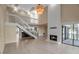 Open staircase with white railings leading to upper level at 1460 Landings Cir # 51, Sarasota, FL 34231
