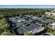 Community tennis courts with multiple courts and seating at 1460 Landings Cir # 51, Sarasota, FL 34231