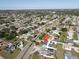 Wide aerial view showing the home's location in the neighborhood at 174 Venice East Blvd, Venice, FL 34293