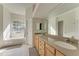 Primary bathroom with double vanity, soaking tub, and separate shower at 21709 Deer Pointe Xing, Bradenton, FL 34202