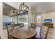 Casual breakfast nook with round table and view of the pool at 21709 Deer Pointe Xing, Bradenton, FL 34202