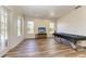 Game room with air hockey table and plenty of natural light at 21709 Deer Pointe Xing, Bradenton, FL 34202