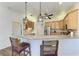 Modern kitchen with stainless steel appliances and wood cabinets at 21709 Deer Pointe Xing, Bradenton, FL 34202