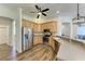 Modern kitchen with stainless steel appliances and breakfast bar at 21709 Deer Pointe Xing, Bradenton, FL 34202