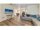 Bright living area with hardwood floors and view to dining area at 21709 Deer Pointe Xing, Bradenton, FL 34202