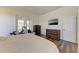 Bright bedroom with wood floors, large windows, and plenty of closet space at 21709 Deer Pointe Xing, Bradenton, FL 34202