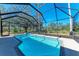 Enjoy this refreshing screened pool with waterfall feature at 21709 Deer Pointe Xing, Bradenton, FL 34202
