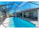 Resort-style screened pool with patio and ping pong table at 21709 Deer Pointe Xing, Bradenton, FL 34202