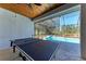 Enjoy this covered patio with ping pong table near the pool at 21709 Deer Pointe Xing, Bradenton, FL 34202