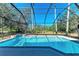 Inviting screened pool with a waterfall feature at 21709 Deer Pointe Xing, Bradenton, FL 34202