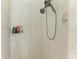 Clean shower with double shower heads and tiled surround at 21709 Deer Pointe Xing, Bradenton, FL 34202