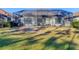 Screened patio and grassy backyard at 249 Palmaria Ct, Nokomis, FL 34275